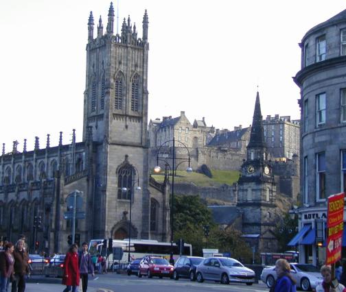 Edinburgh Castle from the junction of Princes Street and Shandwick Place, overlooking St Johns church